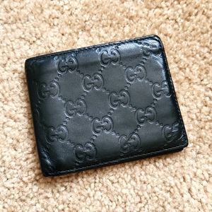 GUCCI GG Signature Bifold Leather Bifold Wallet